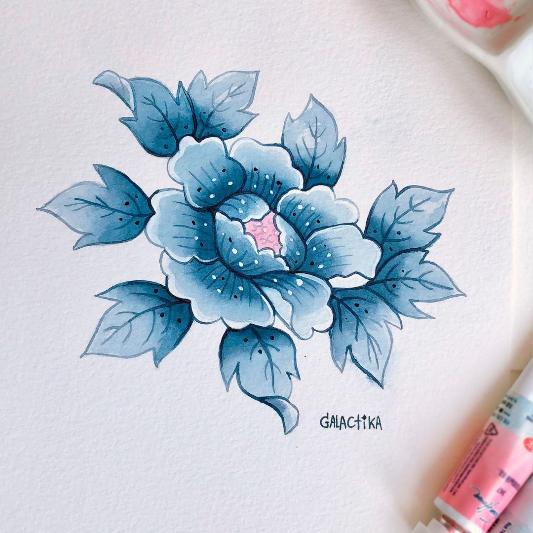 Es una foto de mi ilustración de una flor hecho con acuarelas color indigo y celeste.